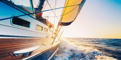 yacht heeling with wind in sails